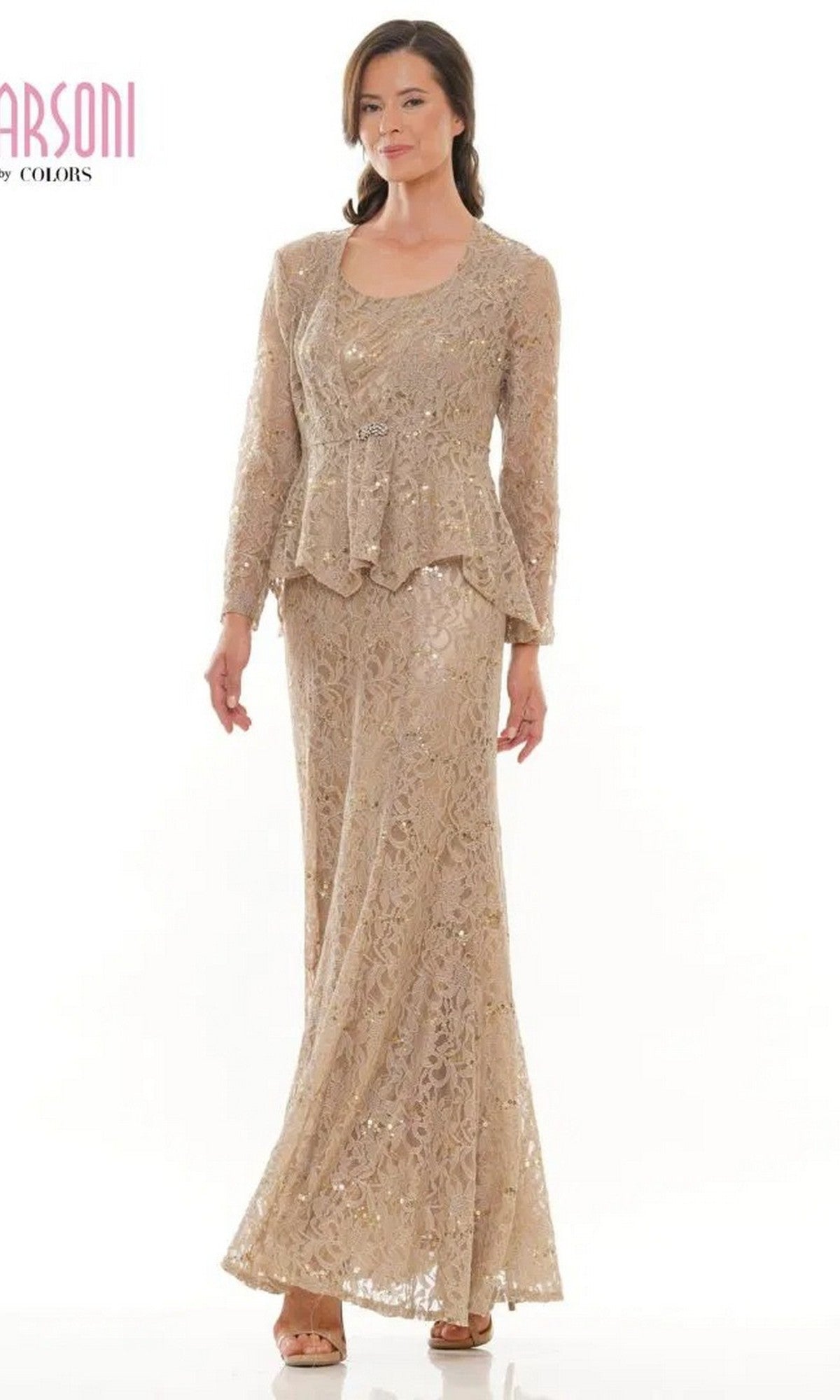 A woman stands against a white background wearing the Marsoni M301 long formal dress in Bermuda Sand, styled as a gown with open-toe shoes.